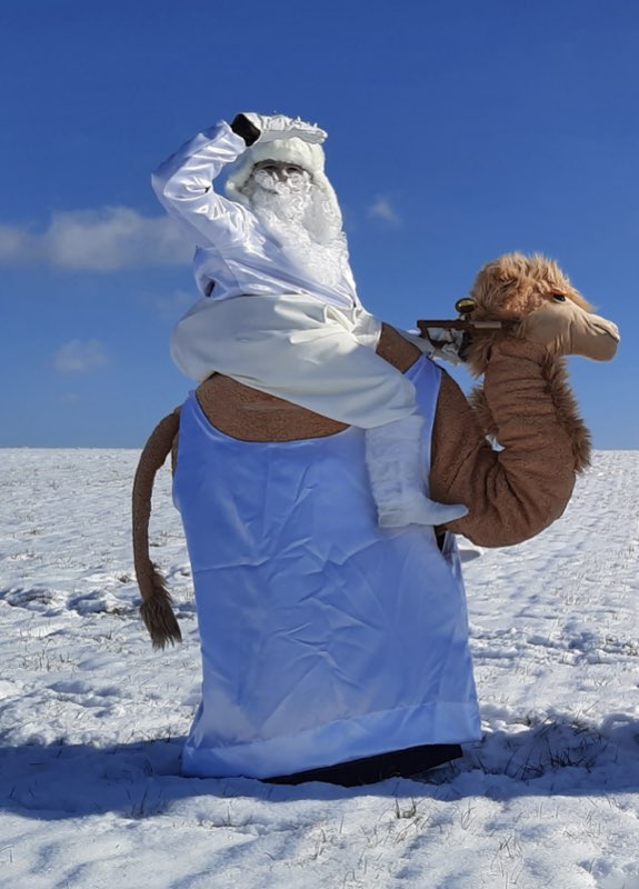 2 Jockeys on their Little Camels