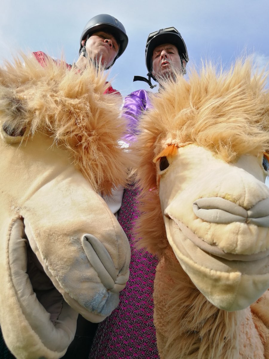2 Jockeys on their Little Camels